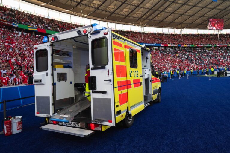 Ambulance takes footballer off pitch