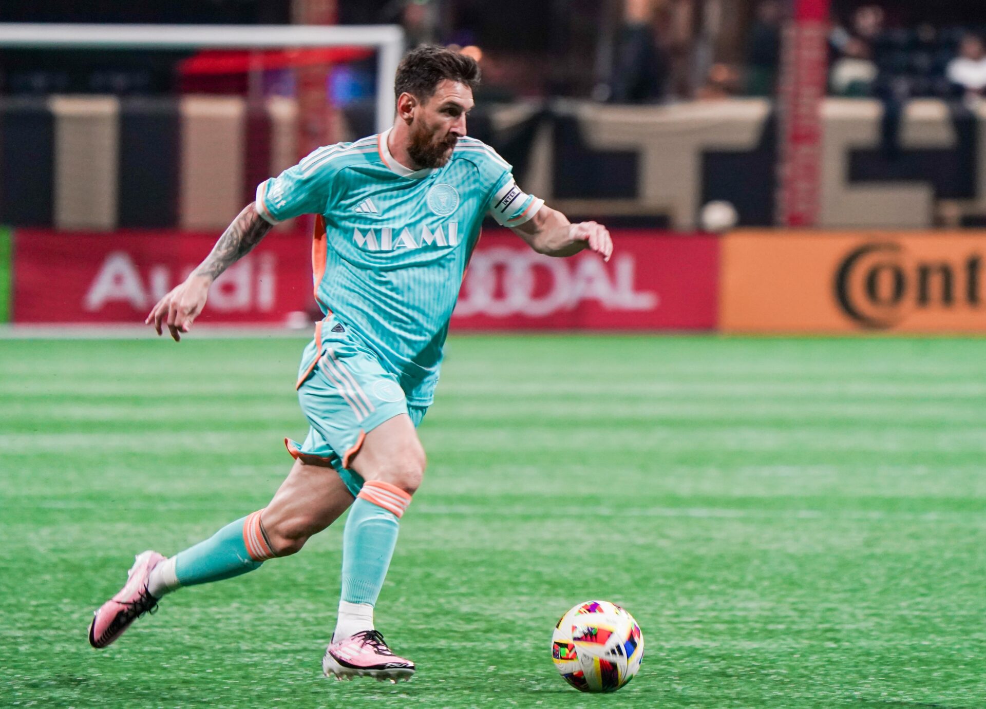 Inter Miami forward Lionel Messi dribbles the ball during match 2 of the 2024 MLS Cup Playoff game against Atlanta United