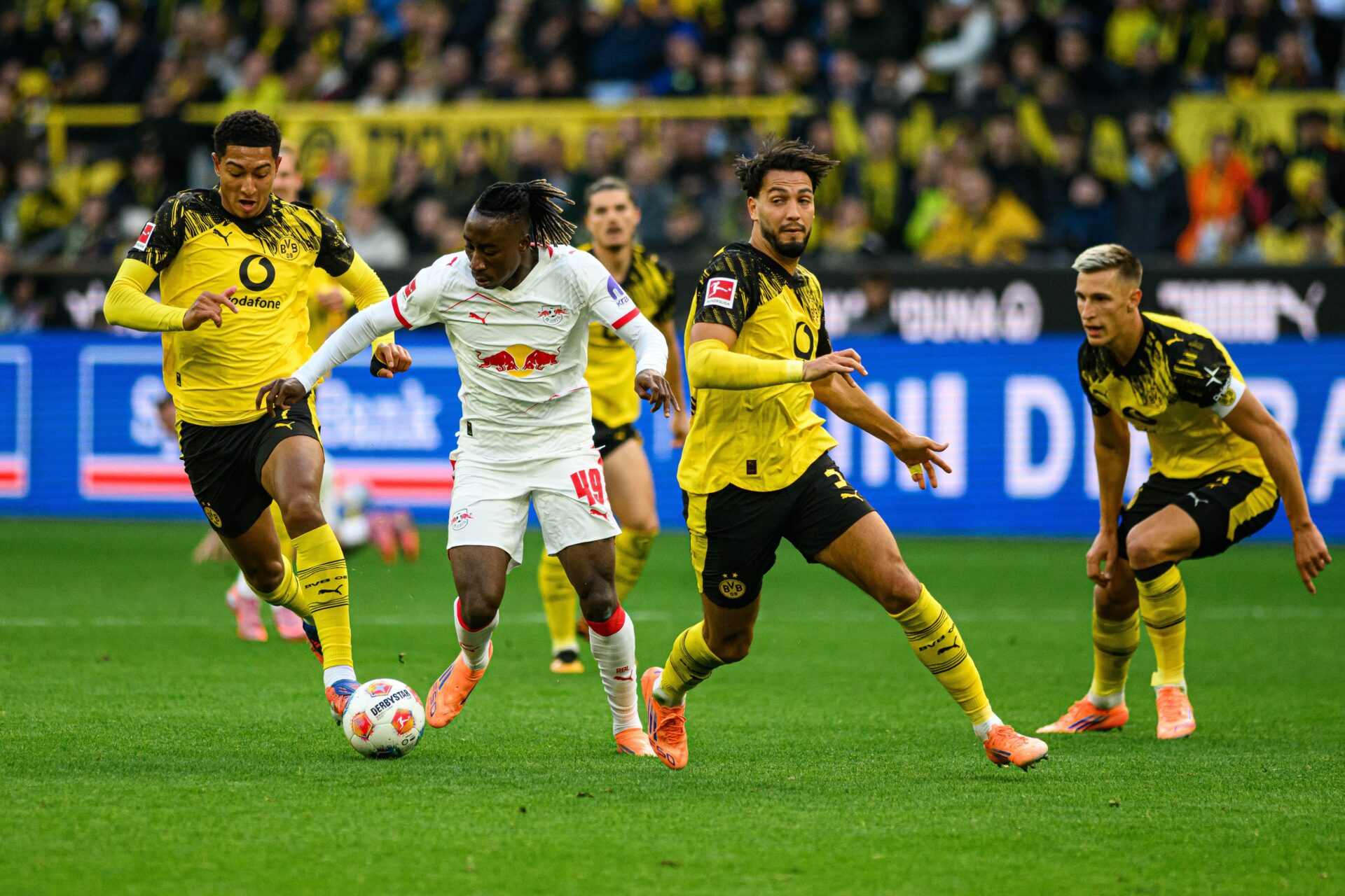 Yan Diomande playing for RB Leipzig against Borussia Dortmund
