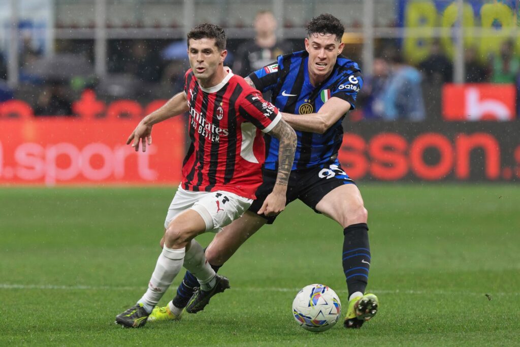 AC Milan midfielder Christian Pulisic battles with Inter's Alesandro Bastoni
