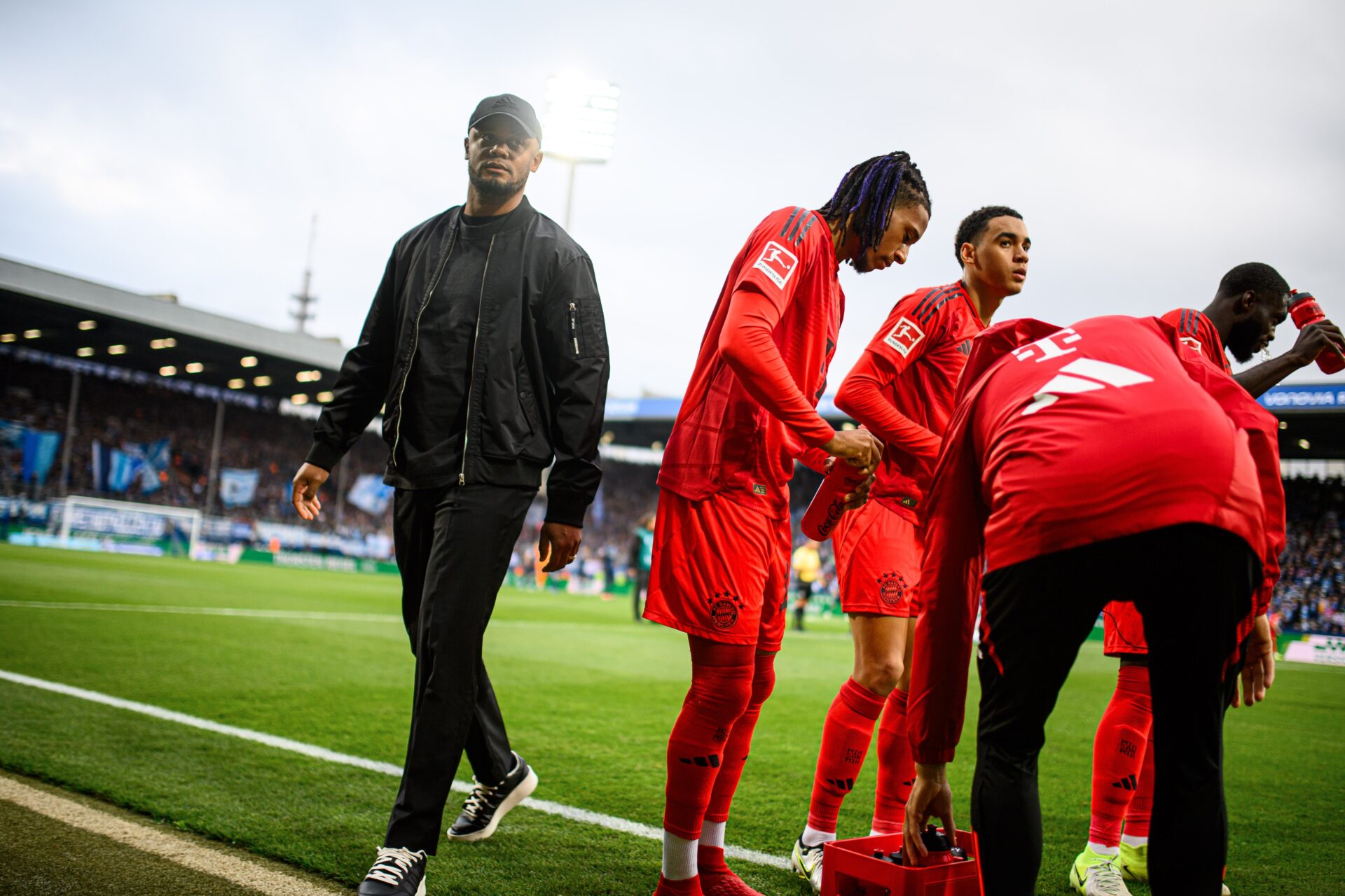 Vincent Kompany with Michael Olise and Jamal Musiala
