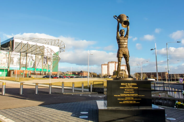 Celtic FC in Glasgow. Billy McNeill statue holding cup in the air