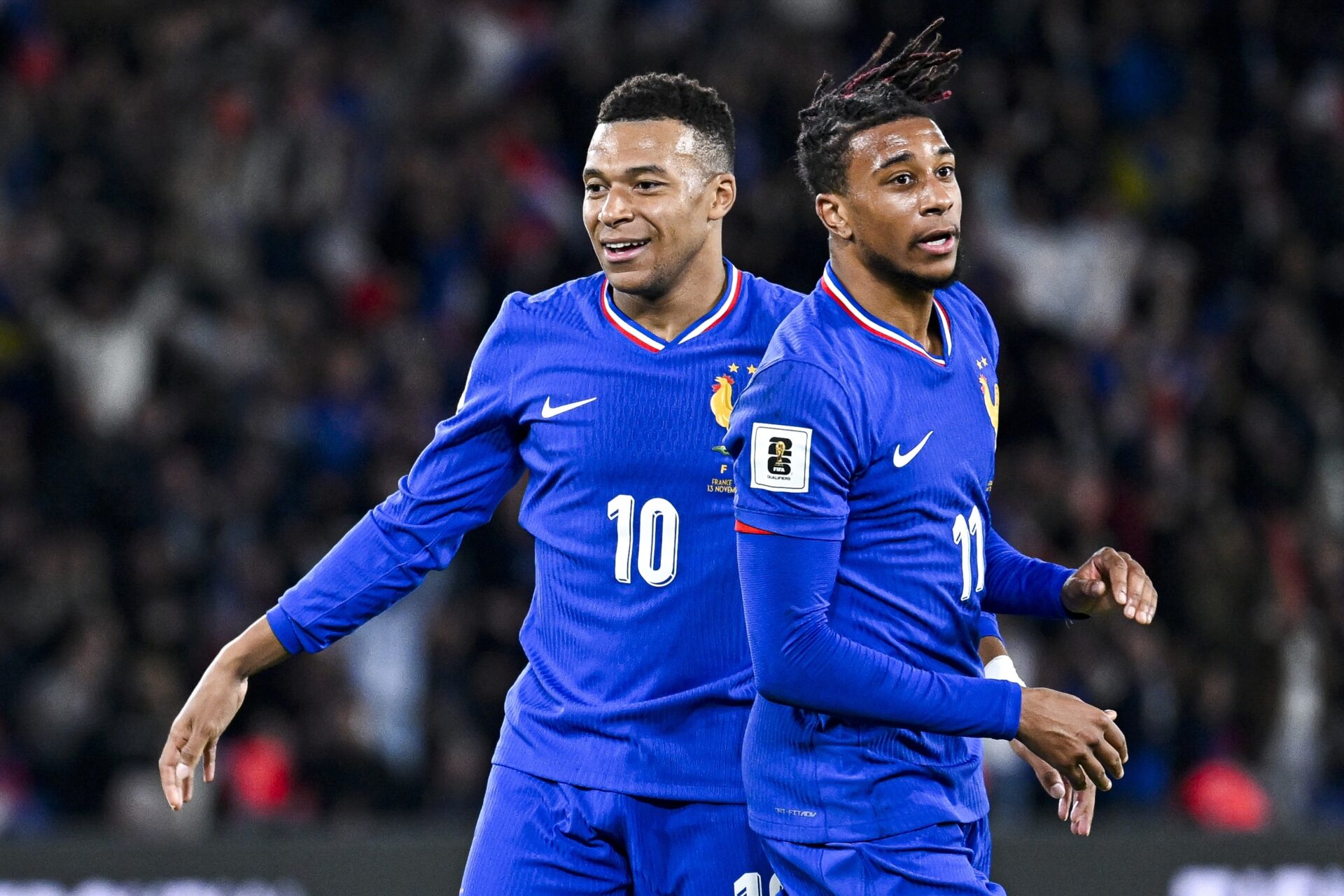 Kylian Mbappe and Michael Olise playing for France